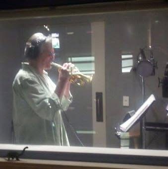 Steve Strand playing piccolo trumpet in studio recording